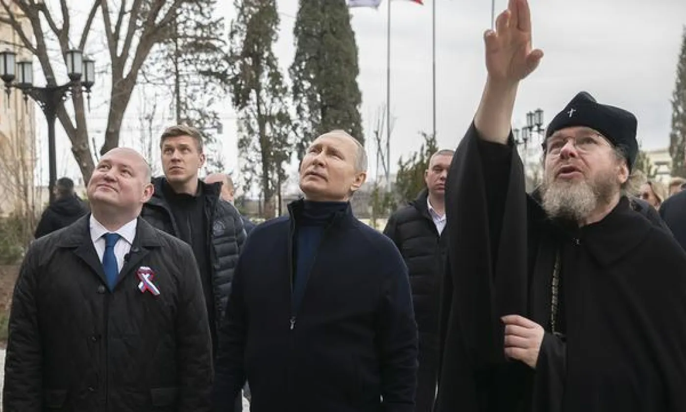 Poutine en visite en Crimée le jour de l'anniversaire de l'annexion Keystone - Kremlin Press via AP